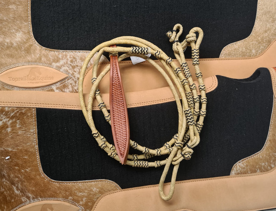 BRAIDED NATURAL RAWHIDE ROMEL REINS WITH LEATHER POPPER.